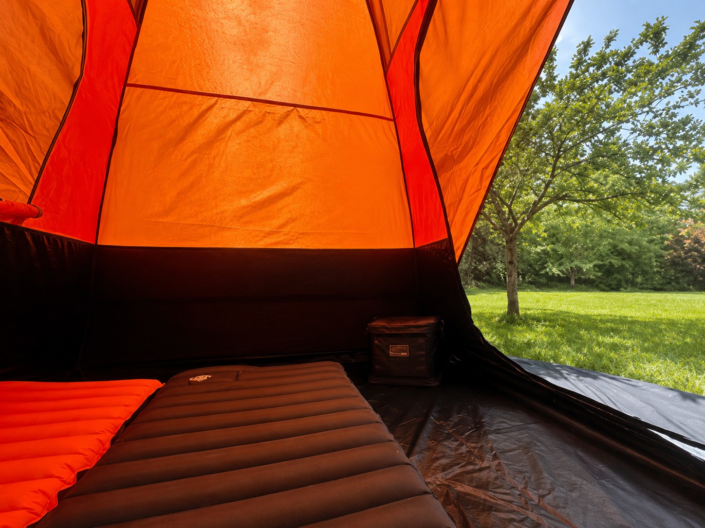Campstash tent interior showing two cots and usable gear space